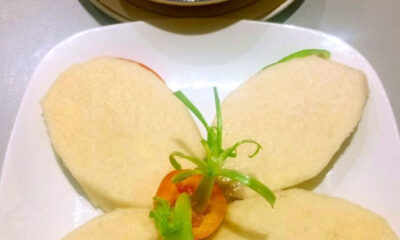 Boiled Yam with Garden Egg Sauce Garnished with Eggs