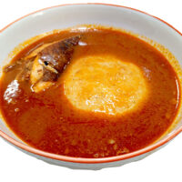 Fufu with Light Soup & Salmon